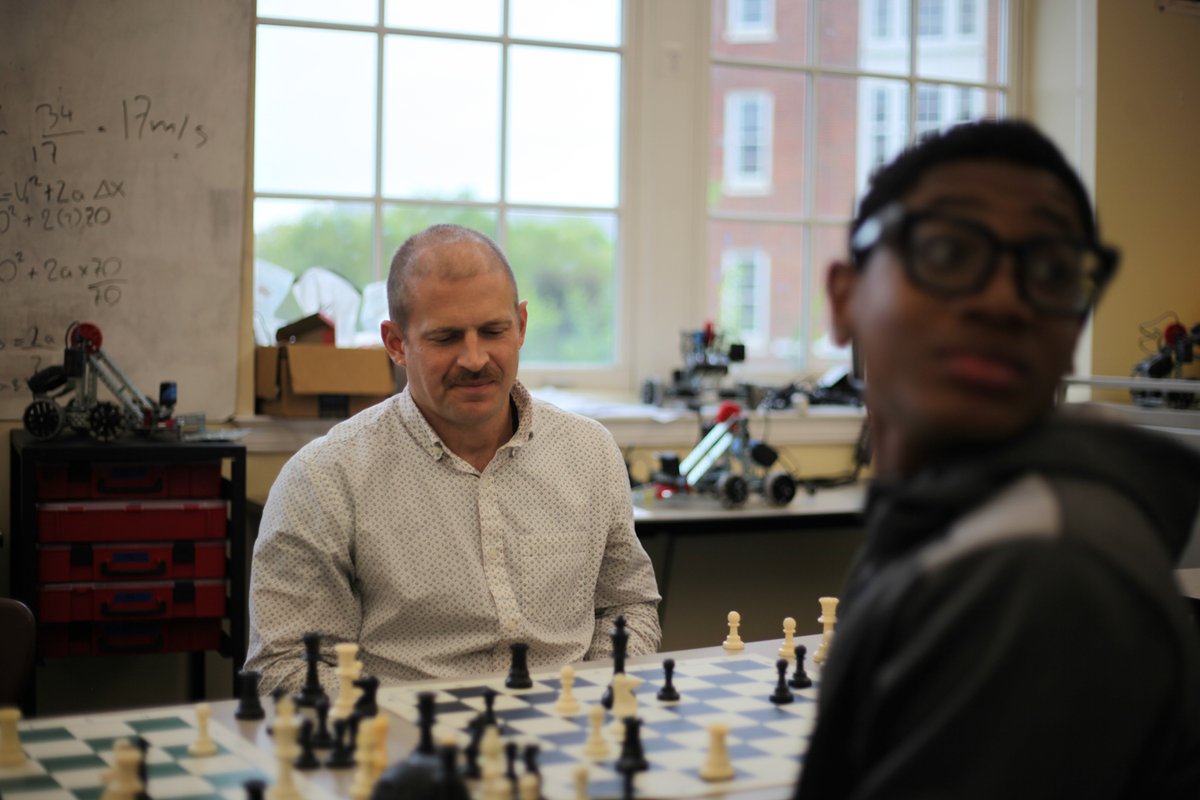 Students playing chess